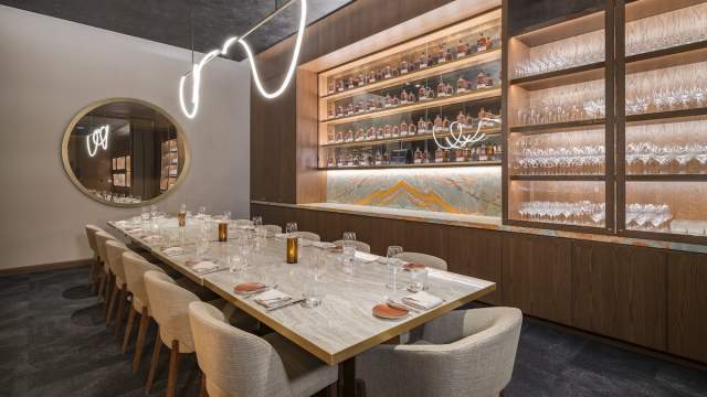 See this beautiful dining table for a large party in the Whiskey Room of Carversteak at Resorts World Las Vegas.