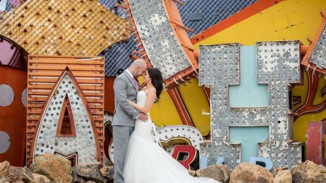 wedding couple at the Neon Museum