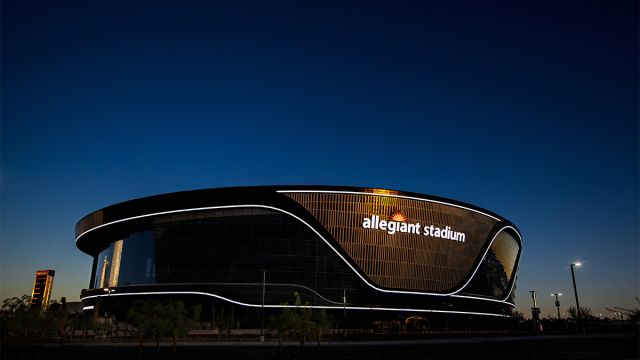 An outside look at Allegiant Stadium during sunset.