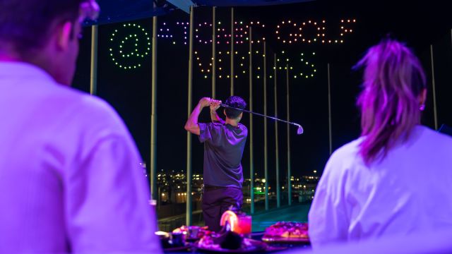 A player enjoying a game at Atomic Golf at the STRAT Hotel, Casino & Tower.