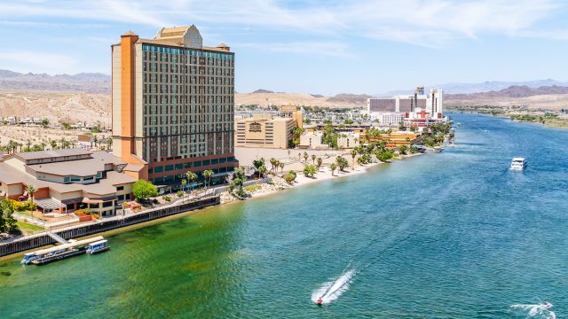 A view of the Laughlin River Lodge Hotel & Casino with the Colorado River in front.