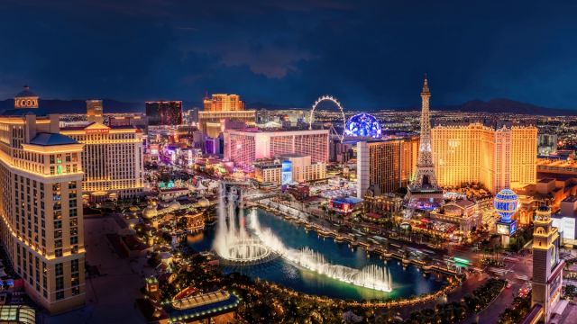 Aerial view of the Las Vegas Strip at night with the Fountains of Bellagio.