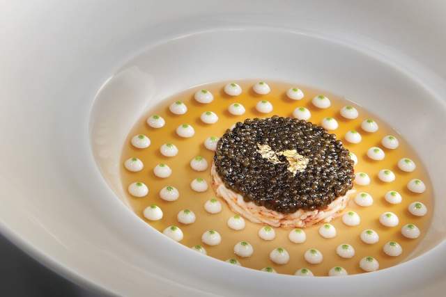 Joël Robuchon crab and caviar dish with gold leaf garnish