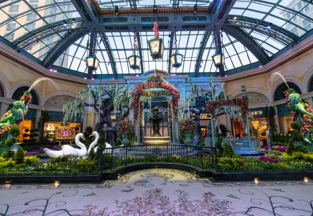 A stunning view of the Bellagio Conservatory & Botanical Gardens, including flowers and decor.
