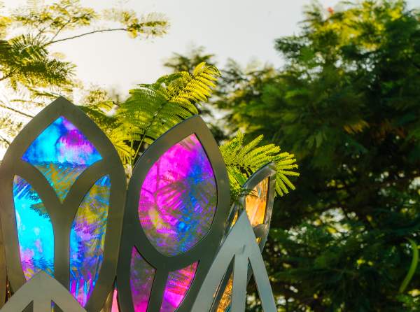 Sunlight sparkles on a sculpture featured at Ilene Lieberman Botanical Gardens in Lauderhill Florida