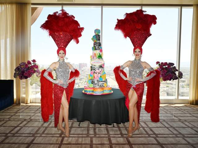 Las Vegas Showgirls with the 120th Birthday Cake
