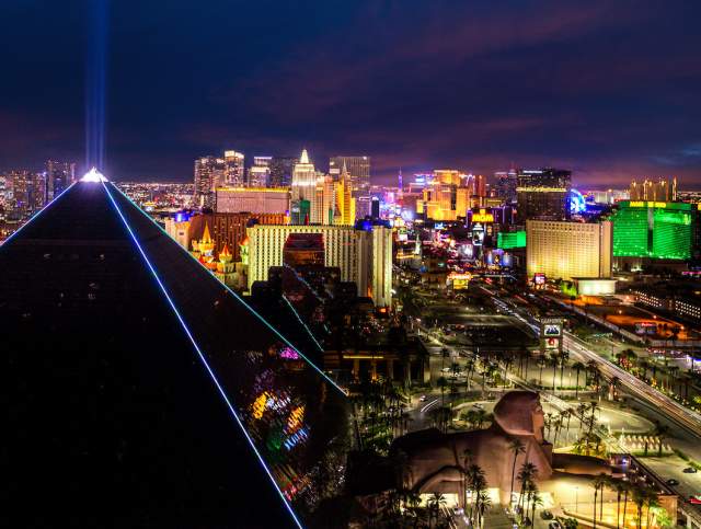 Take a look at this stunning view of the one and only Las Vegas strip during the evening with a focus on The Luxor.