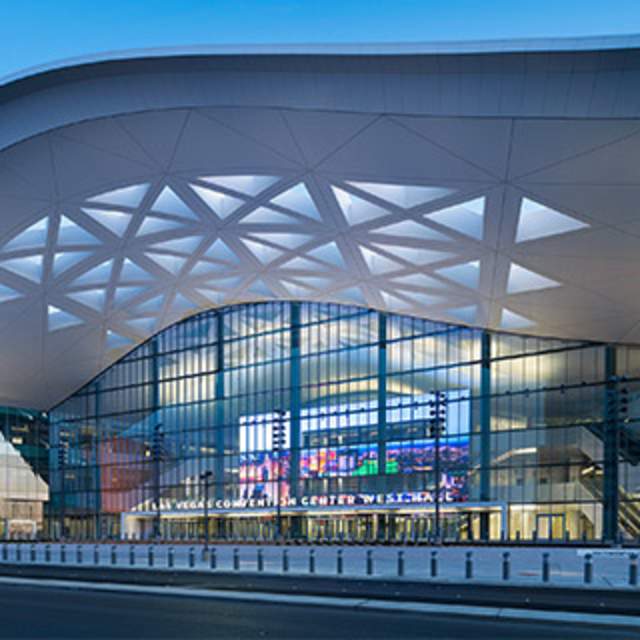 Photo of the entrance to the Las Vegas Convention Center at dusk.