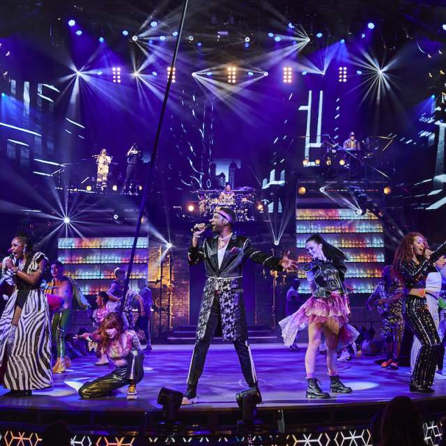 A group of performers giving it their all during the Mad Apple show by Cirque du Soleil.