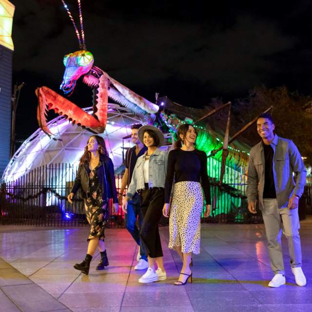 A group of friends walking in Downtown Container park in Las Vegas.