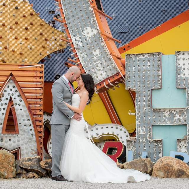 wedding couple at the Neon Museum