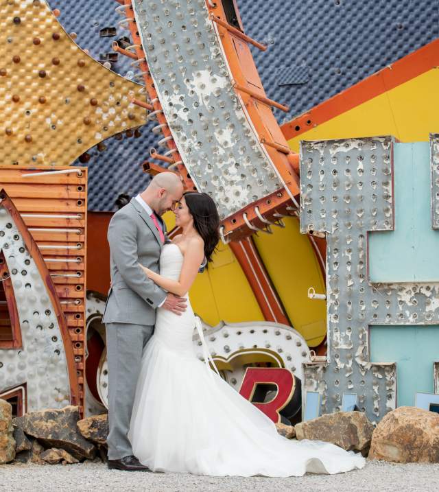 wedding couple at the Neon Museum