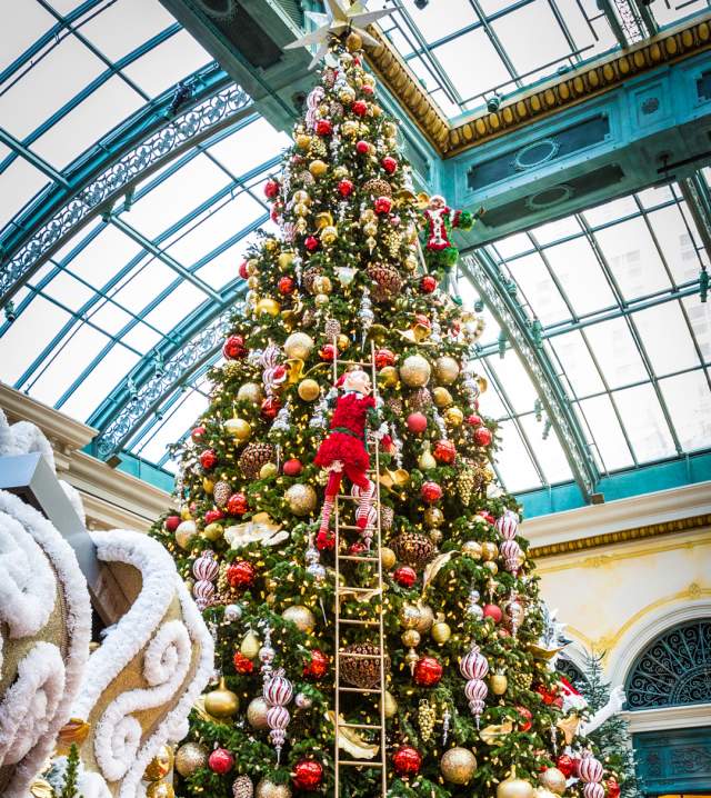 A Christmas tree is decked in holiday cheer at the Bellagio's Conservatory & Botanical Gardens