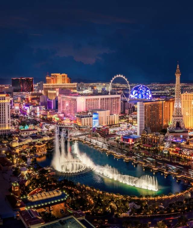 Aerial view of the Las Vegas Strip at night with the Fountains of Bellagio.