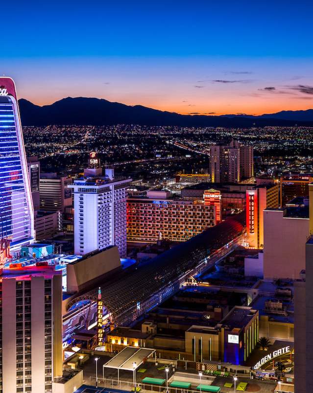 Appreciate the stunning view of Downtown Las Vegas at dusk.