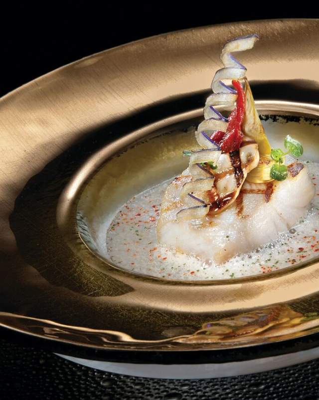 Joël Robuchon at MGM Las Vegas featuring a black cod dish.