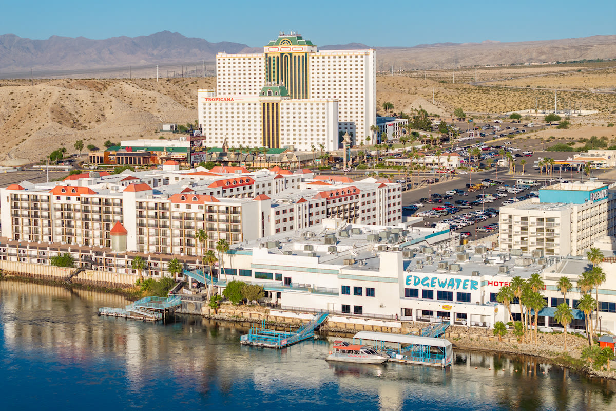 A skyline view of Laughlin during the day with a stunning mountain range in the background.