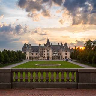 The sun sets behind the beautiful Biltmore in Asheville.