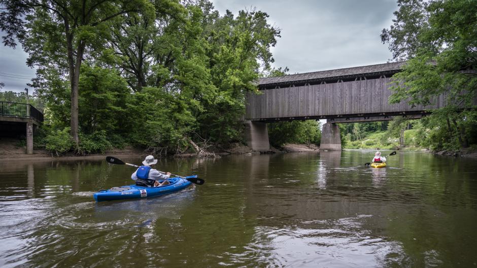 Jeff and Rita Newman, owners of GR Paddling, kayak down the Grand River.
