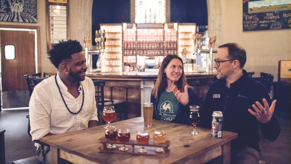 Grand Rapids' Brewery Vivant Owners Sitting at a Table