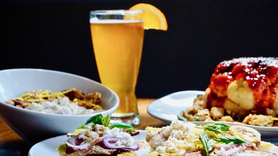 The Green Well's menu highlights farm to fork options for RWGR, including the Whole Roasted Cauliflower with tofu fried rice, kimchi, sweet glaze, and sesame.