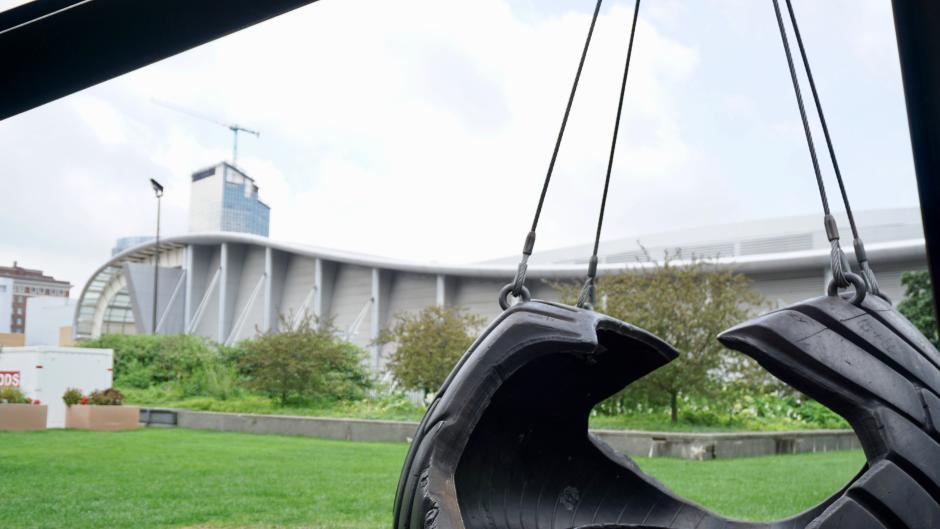 Motu Viget Sculpture with the DeVos Place in the background.