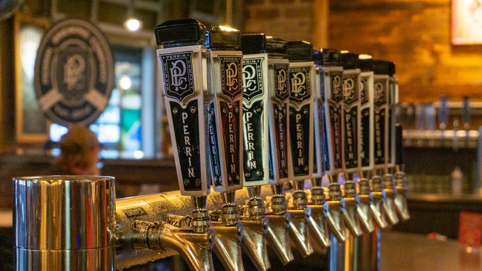 A row of beer taps at Perrin.
