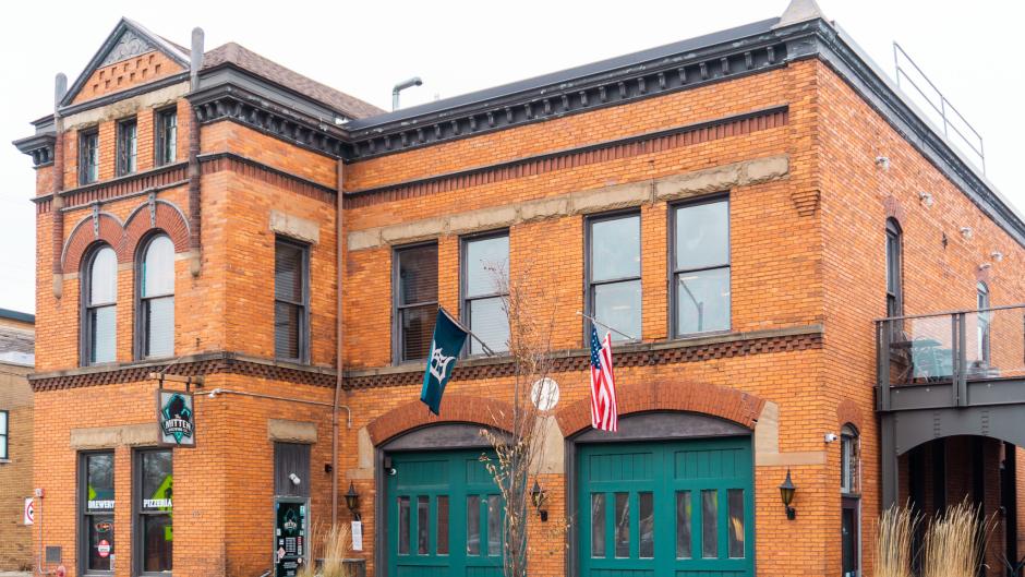 Outside The Mitten Brewing Company building.