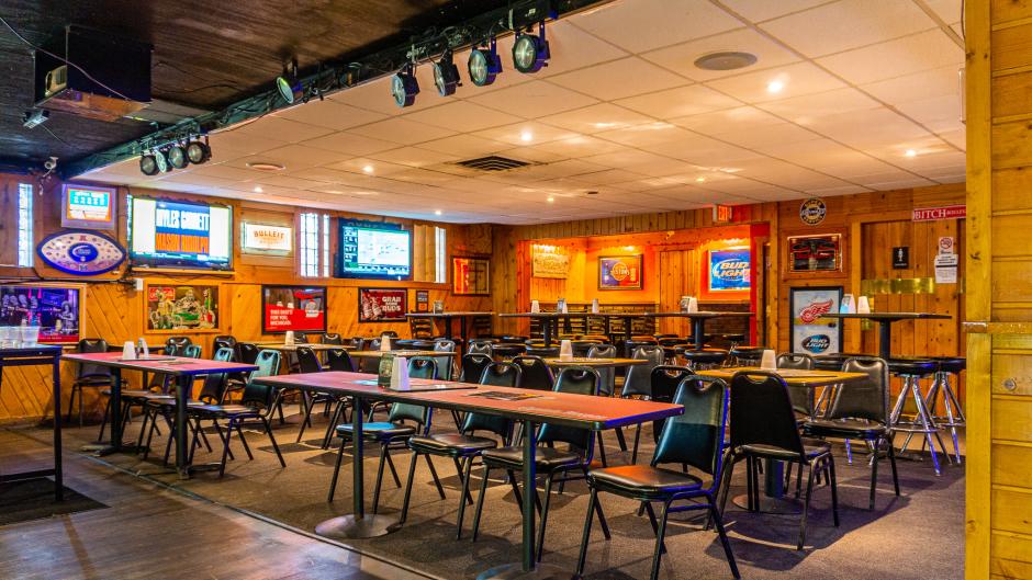 Log Cabin's dining area and stage for karaoke.