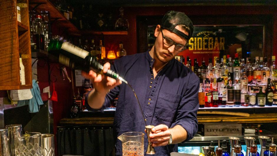 Bartender making a cocktail at Sidebar