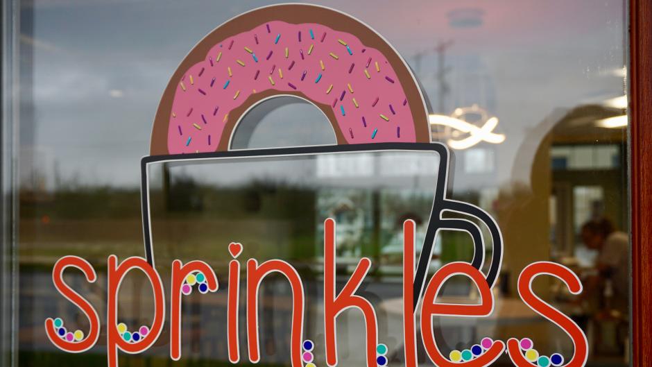 Store front window for Sprinkles Donut Shop in Grand Rapids