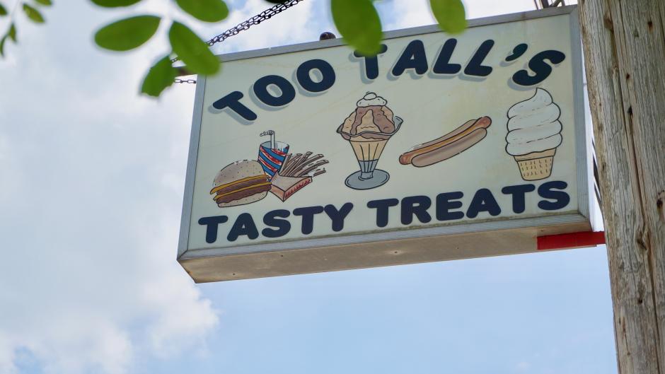 Too Tall's sign
