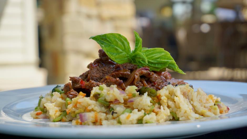 Visit FireRock Grille during RWGR to enjoy savory meat dishes like the Shaken Beef, which is a filet of beef, stir fried red onions, French beans, and basil with sweet chili sauce served over shrimp fried rice.
