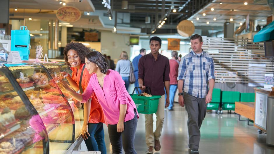 Friends and family shopping and exploring at Downtown Market
