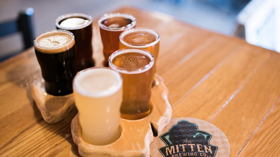 Flight of beer on a lower peninsula-shaped board at The Mitten Brewing Co. in Grand Rapids