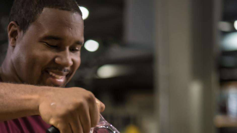 Located in the Grand Rapids Downtown Market, Jermale Eddie, co-owner of Malamiah Juice Bar, serves healthy and delicious smoothies, juices, and acai bowls.
