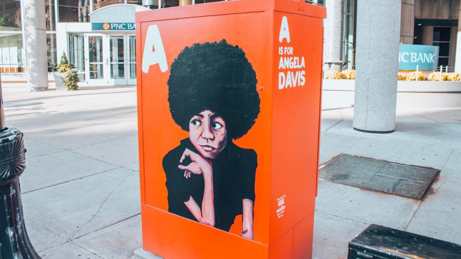 Painting of a woman in downtown Grand Rapids.