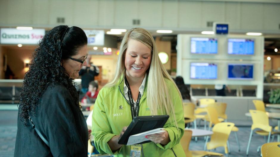 "Green coat" staff are available to help Gerald R. Ford International Airport travelers navigate the growing airport and Grand Rapids community.