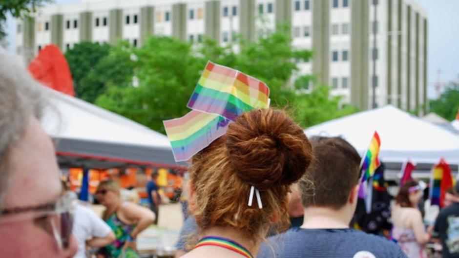 Attendee wearing pride flags in her hair at the Grand Rapids Pride Festival