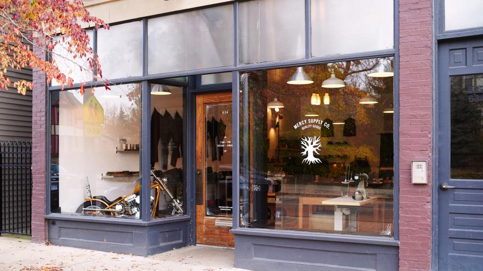 Suit up for your next cross-country bike tour at Mercy Supply Co. (motorcycle in the storefront not included).