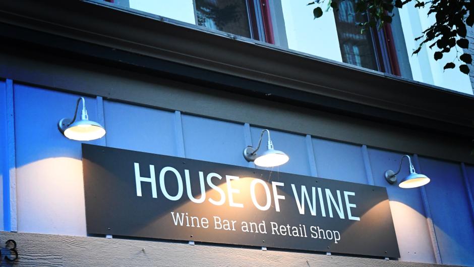 Outdoor sign at House of Wine