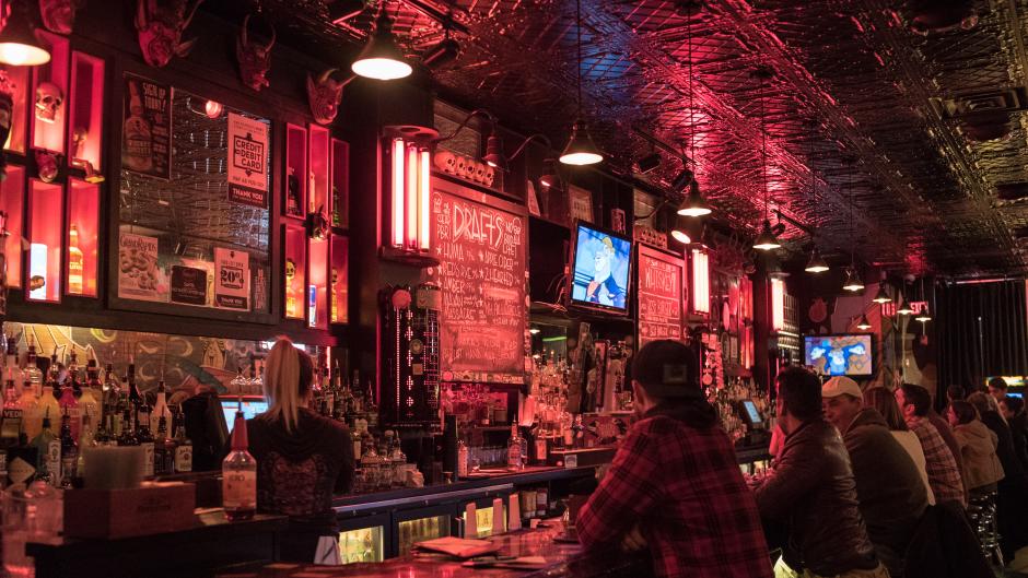 Patrons at the bar at Stella's Lounge in Grand Rapids
