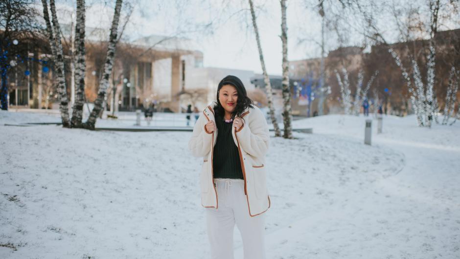 Ashley Wierenga wearing a winter outfit near Rosa Parks Circle and the art museum.