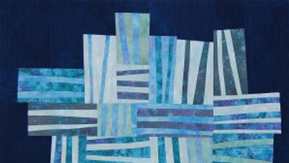 Quilt on display at the American Quilters Society Show (AQS).
