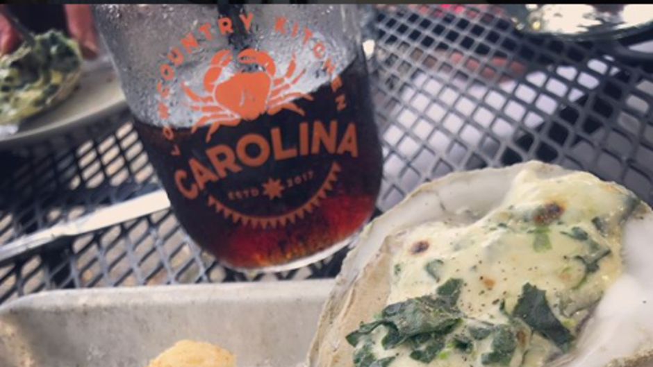 Carolina Lowcountry Kitchen’s oysters Rockefeller feature grilled Blue Point oysters with cream, Penod liqueur, spinach and parmesan.