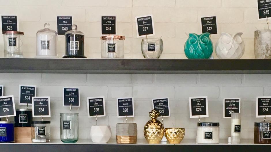 shelves of candles at Wax Poetic in Grand Rapids