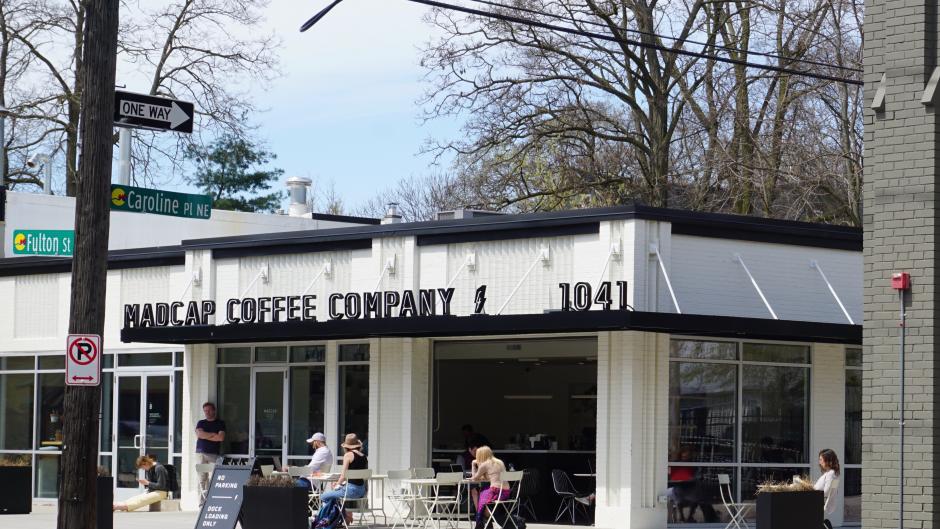 Madcap opens the garage doors out onto a patio during warmer weather months.