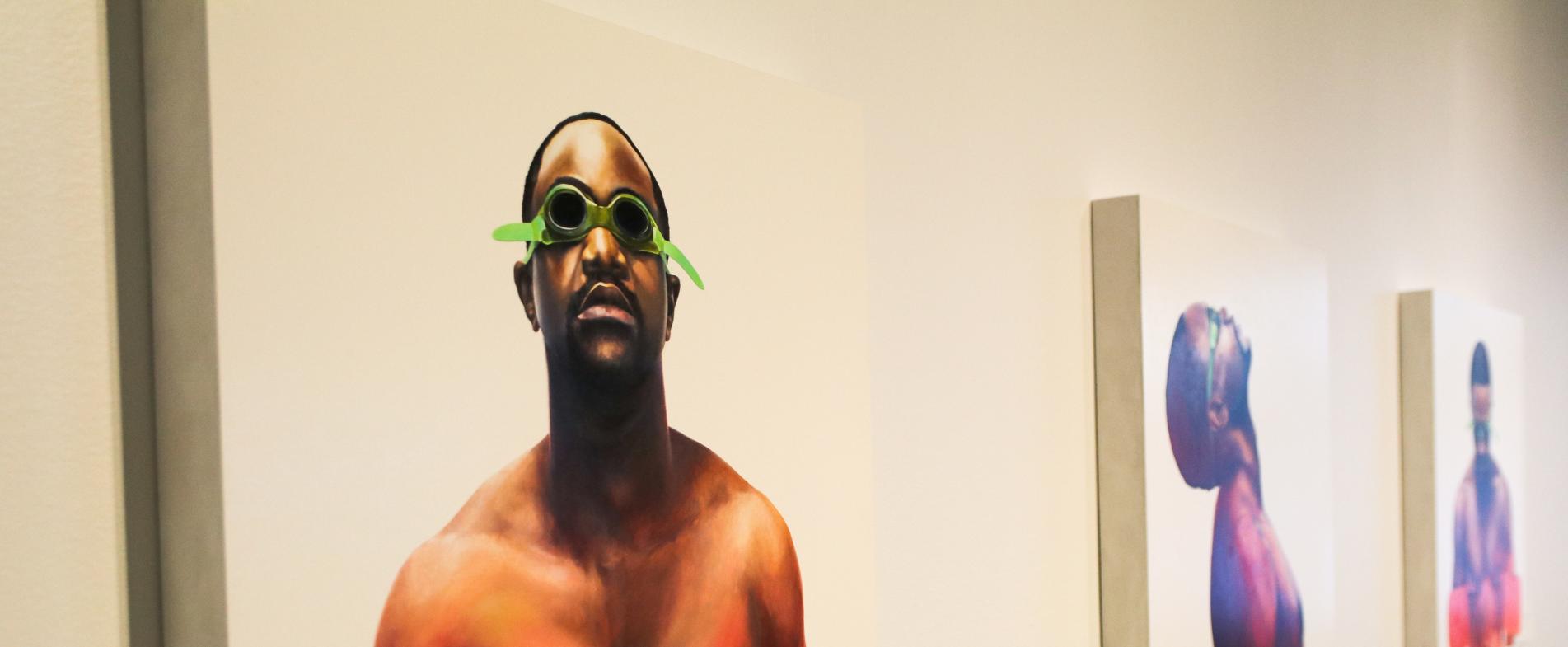 "Warm Water" creator, Charles Edward Williams, depicts himself in floaties and goggles as he learns how to swim as an adult.