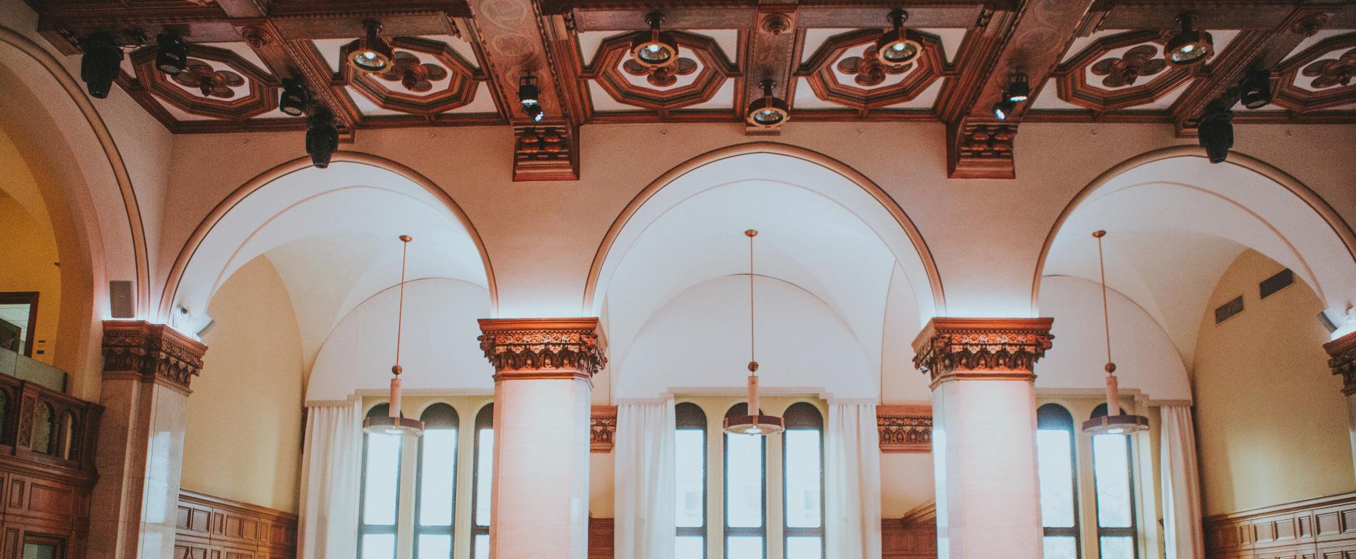 The Ballroom at CityFlatsHotel provides grand views and high ceilings for a timeless wedding venue.