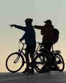 Two people biking in Oslo